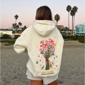 Oversized Dandy “gift giving” hoodie sweatshirt.